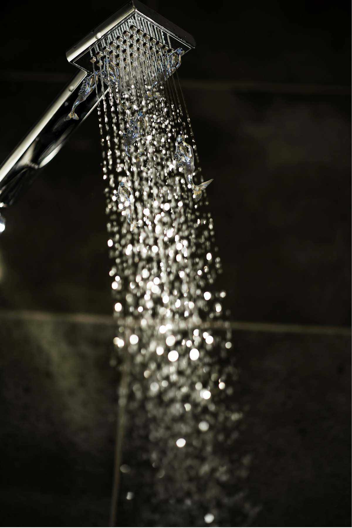 Shower with clean flowing water — pairing a whole house carbon filter with a water softener provides complete treatment for every faucet, shower, and appliance