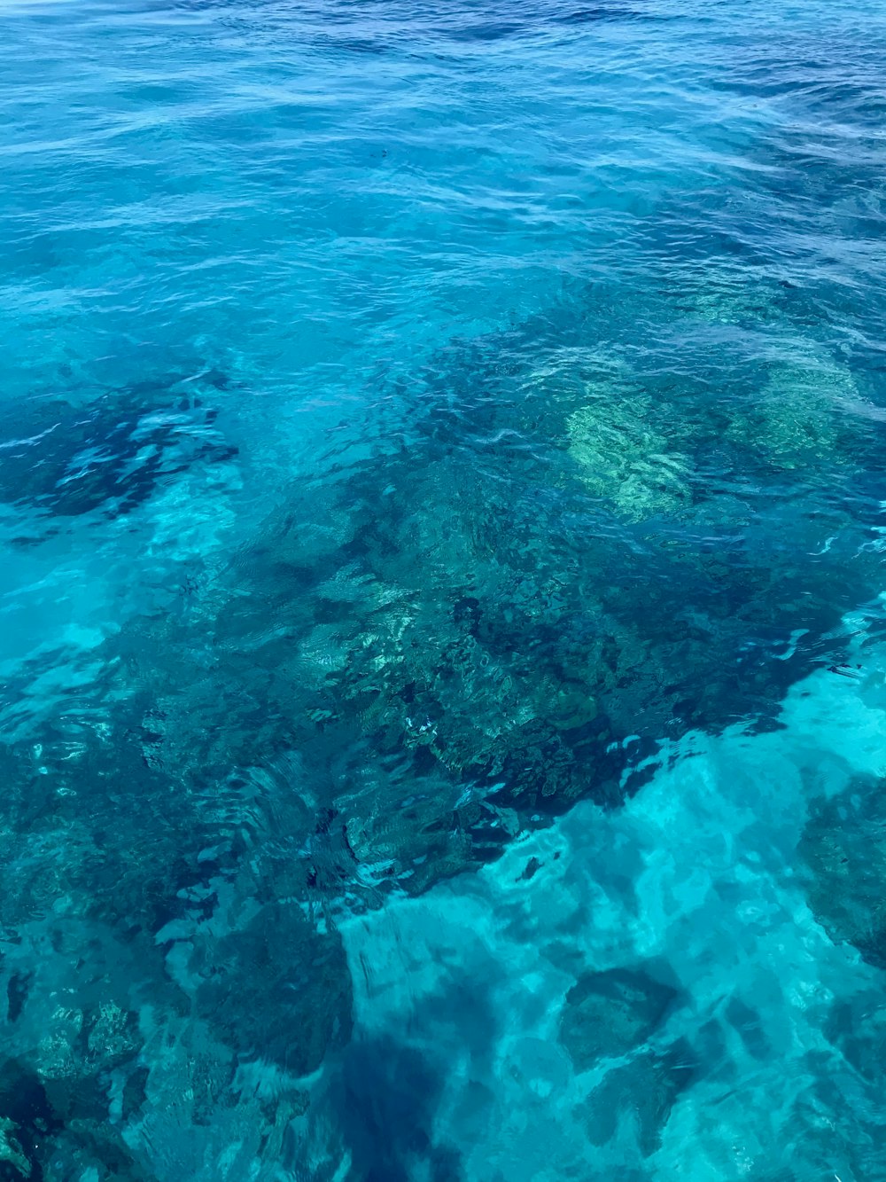 a large body of water with a boat in it