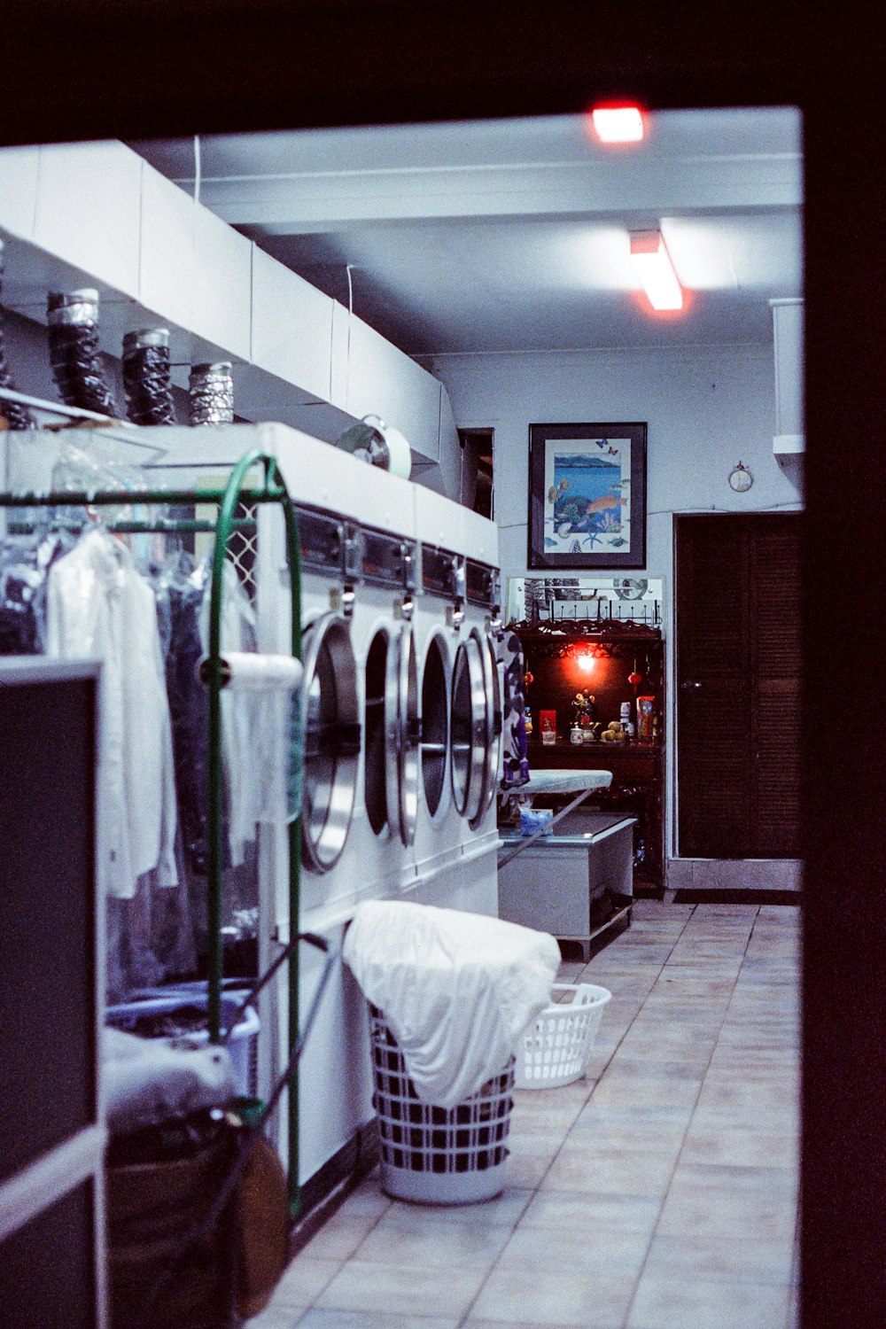 a laundry room with a washing machine and dryer