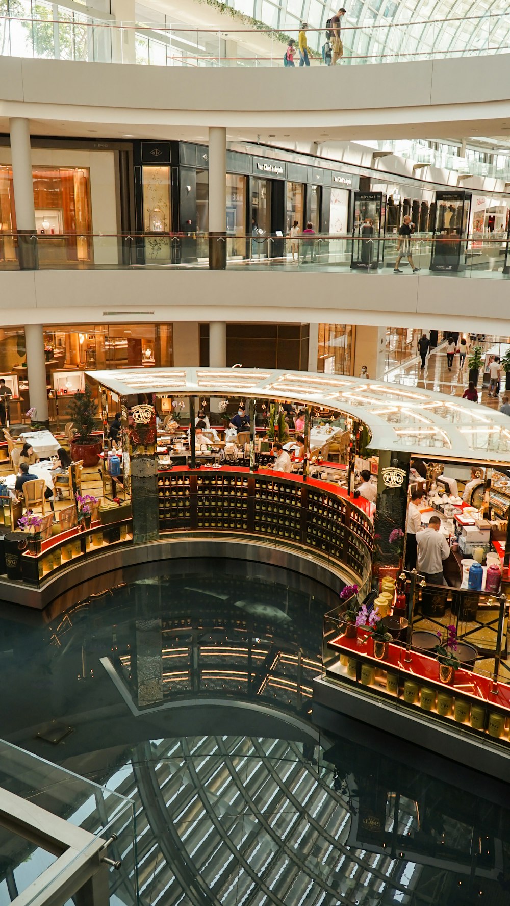 a shopping mall filled with lots of people