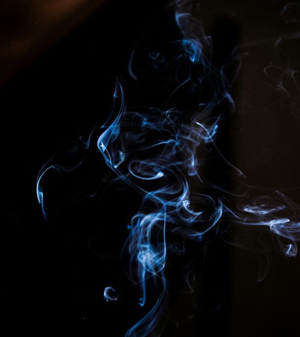 a close up of smoke on a black background