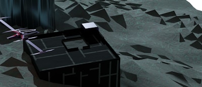 A futuristic landscape featuring a geometric, dark structure situated on an undulating, textured terrain. A sleek, angular craft with elongated wings hovers or rests near the building, suggesting a sci-fi or advanced technological theme. The environment appears barren and otherworldly.