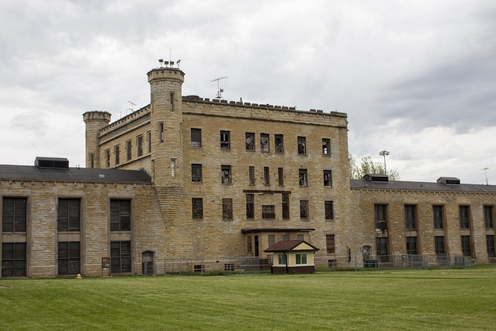 a large brick building with a clock tower