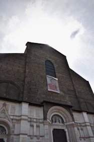 An archival photo showcasing a historic milestone in the church’s journey, framed with subtle African-inspired design elements.