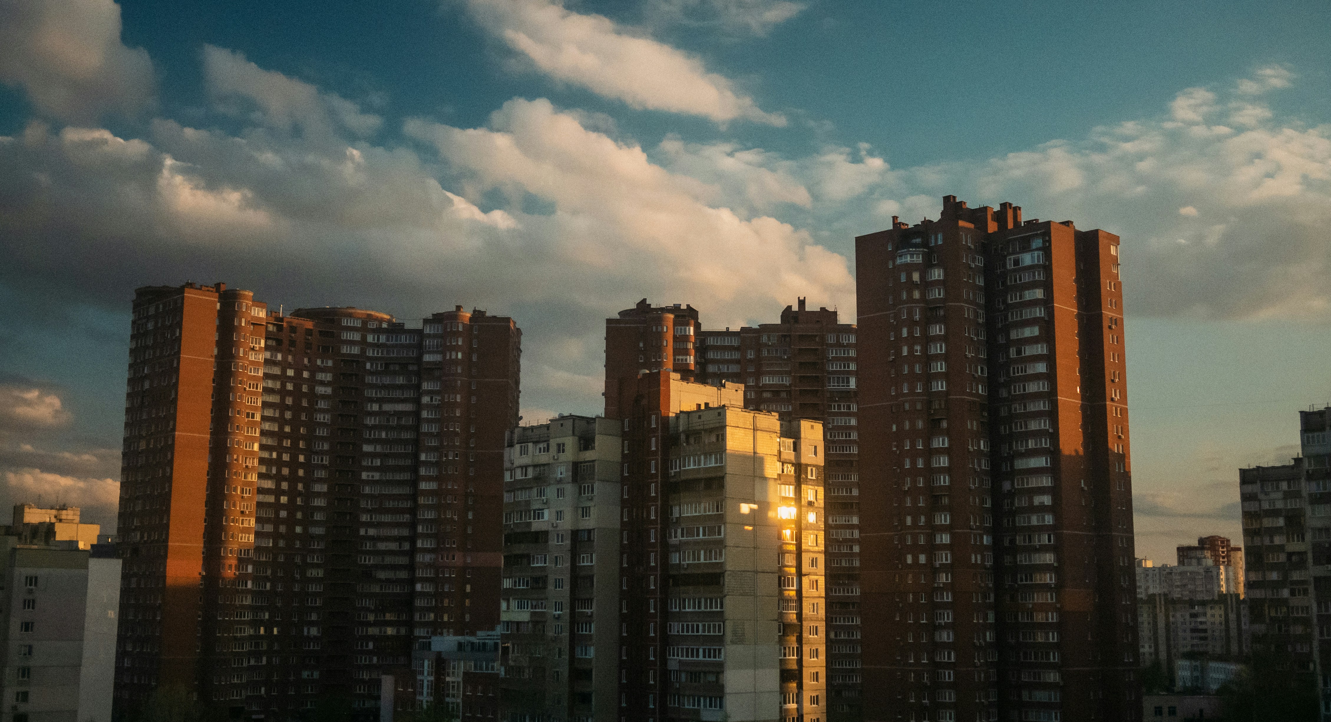 a group of tall buildings sitting next to each other