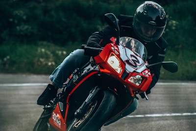 A rider enjoying a thrilling ride on a sports motorcycle.