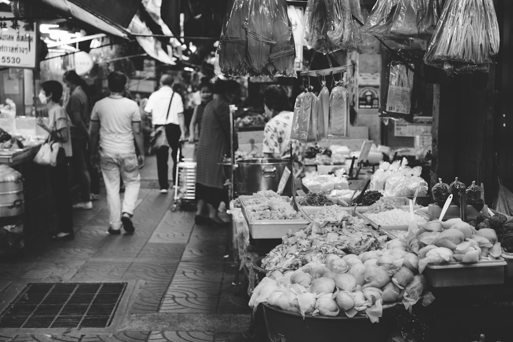 a black and white photo of a market