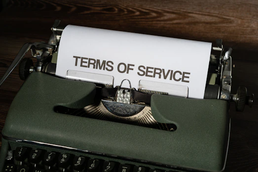 a close up of a typewriter with a paper on it