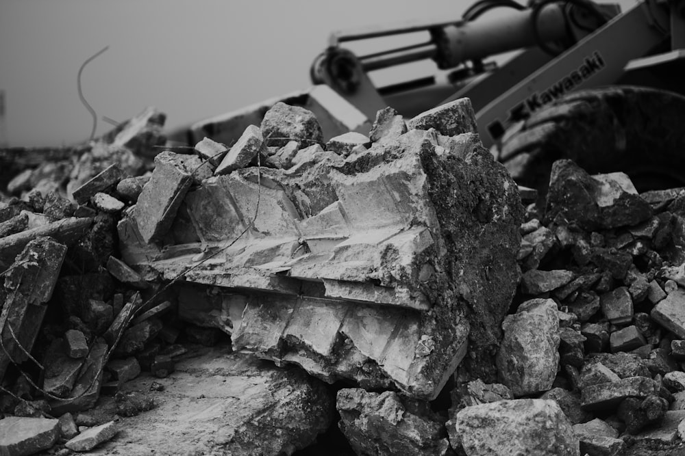 a black and white photo of a pile of rubble