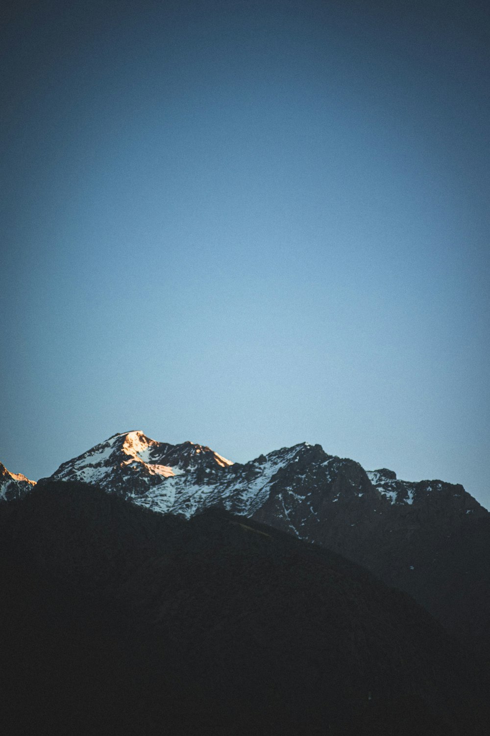 a view of the top of a snowy mountain