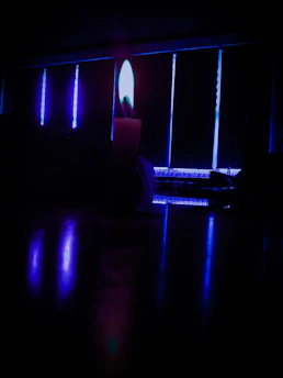 A serene blue and gray themed consultation room with mystical symbols softly glowing.