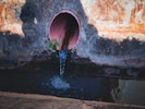 a pipe with water coming out of it