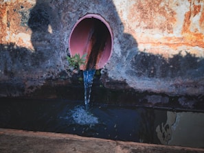 a pipe with water coming out of it
