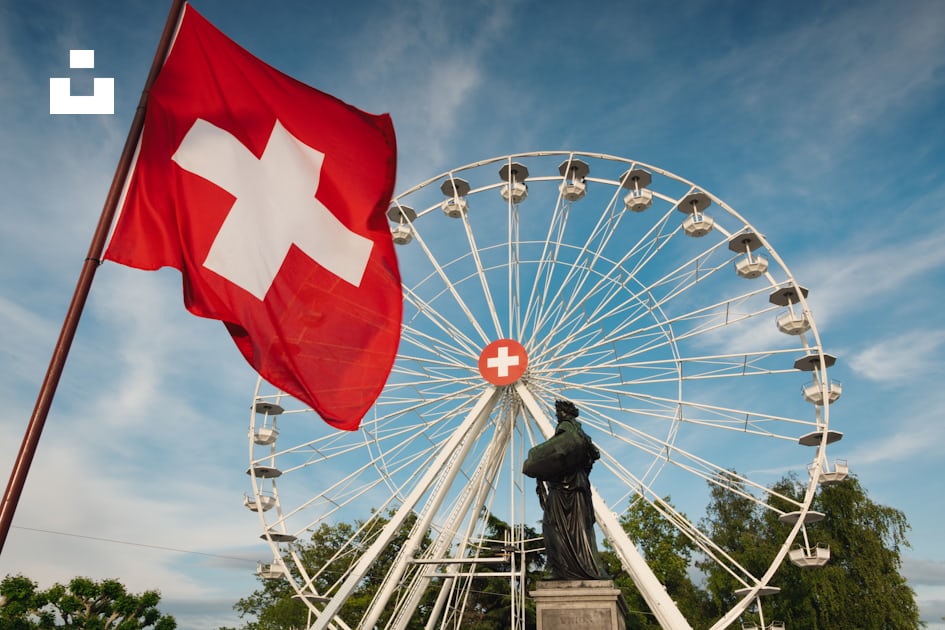 Foto Una gran noria sentada junto a una estatua – Imagen Ginebra gratis en  Unsplash