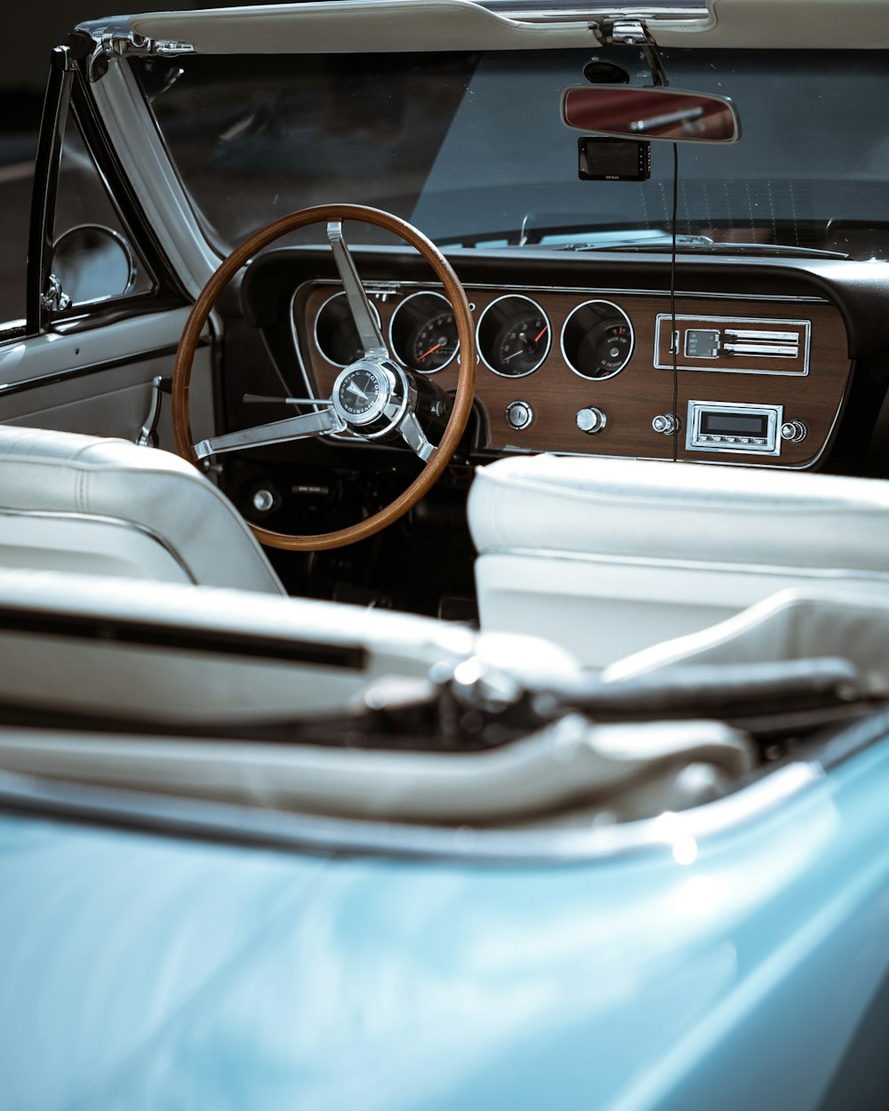 a car with a steering wheel and dashboard