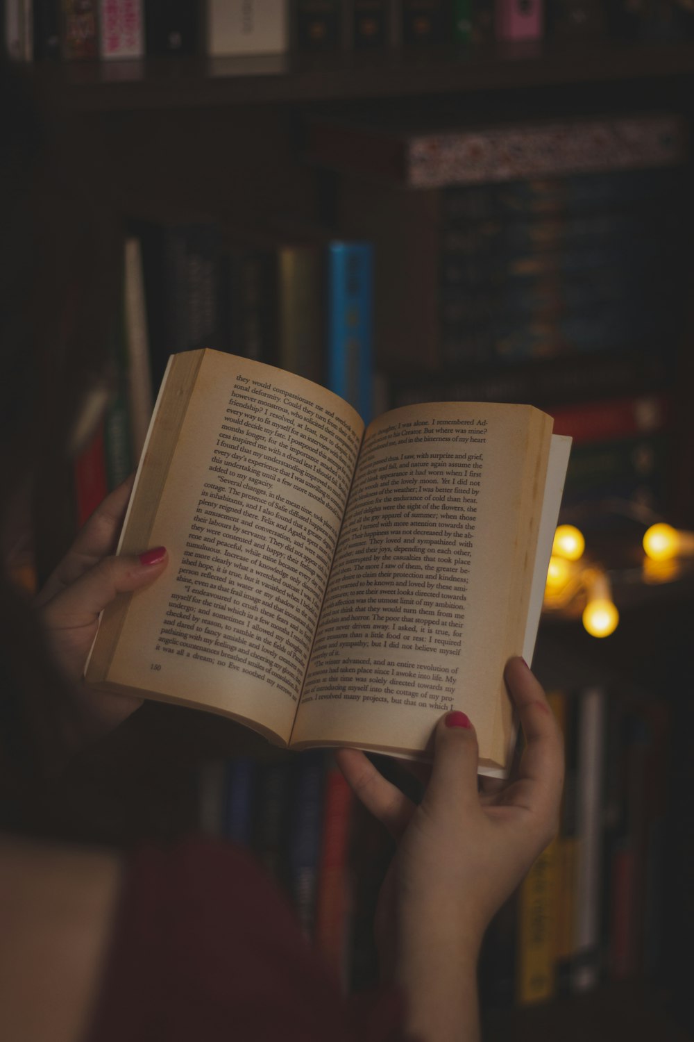 a person holding a book in their hands