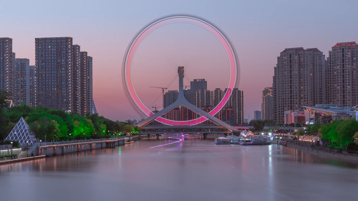 a ferris wheel in the middle of a city