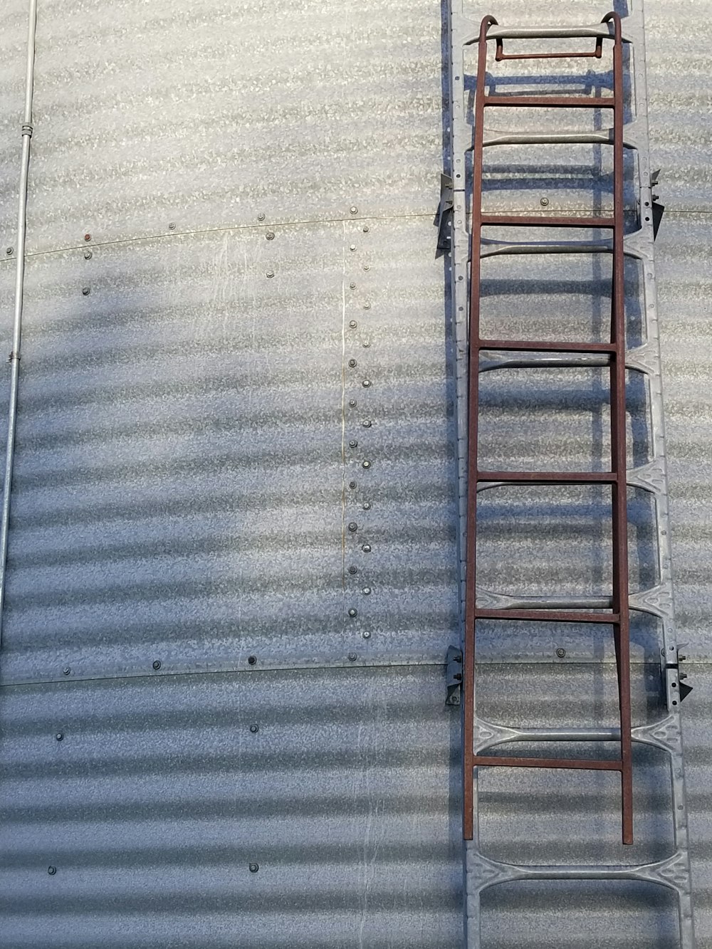 a ladder leaning against the side of a building