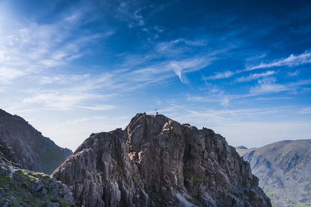 a person standing on top of a mountain