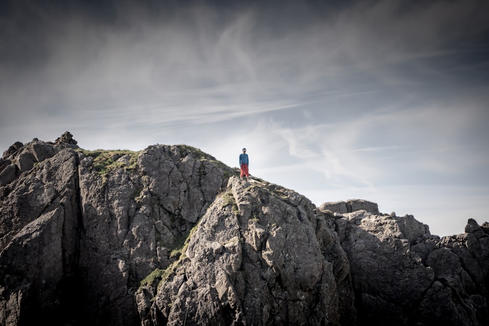 a person standing on top of a mountain