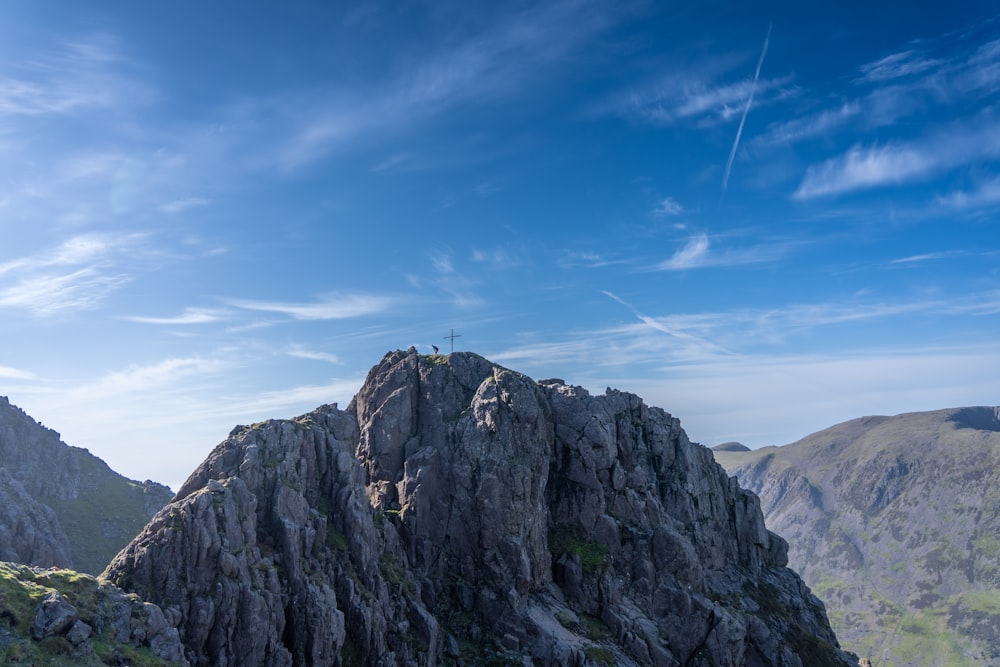 a person standing on top of a mountain