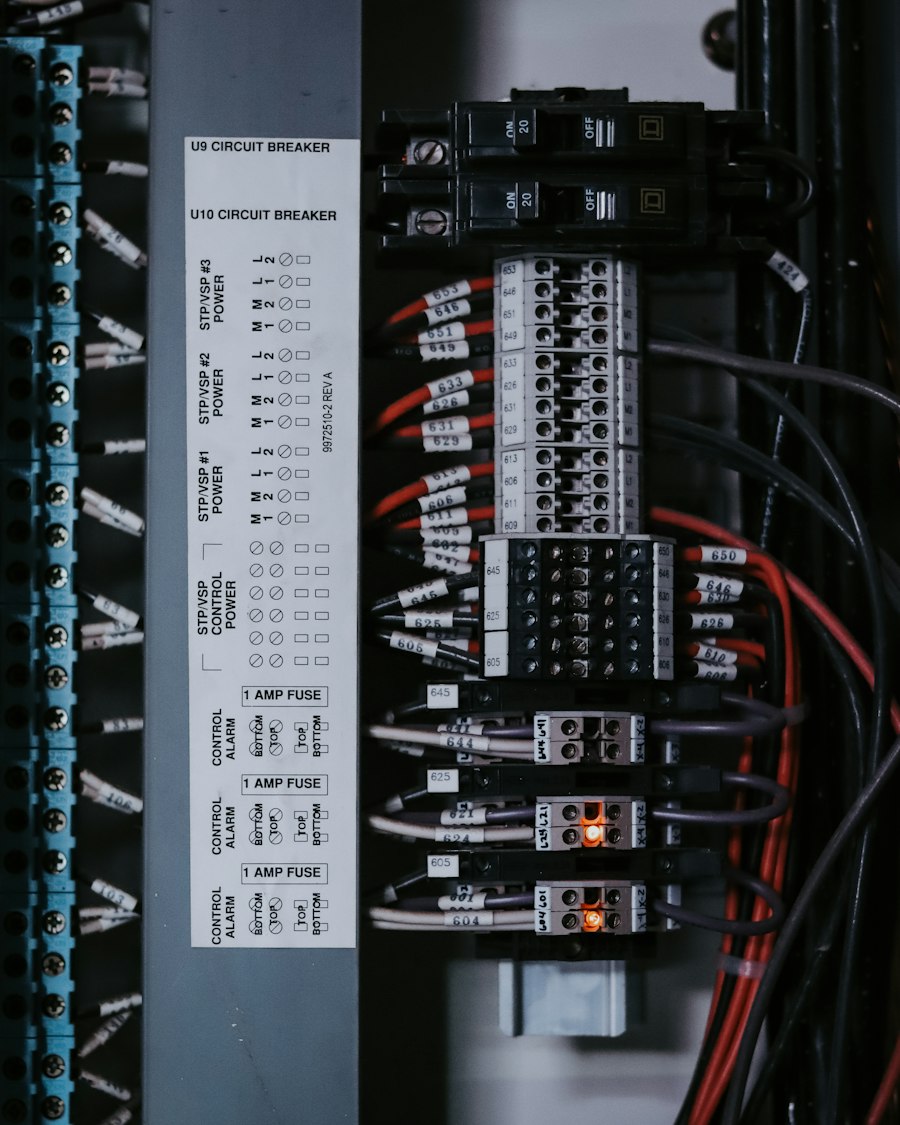 Control panel wiring being traced during a fault diagnosis