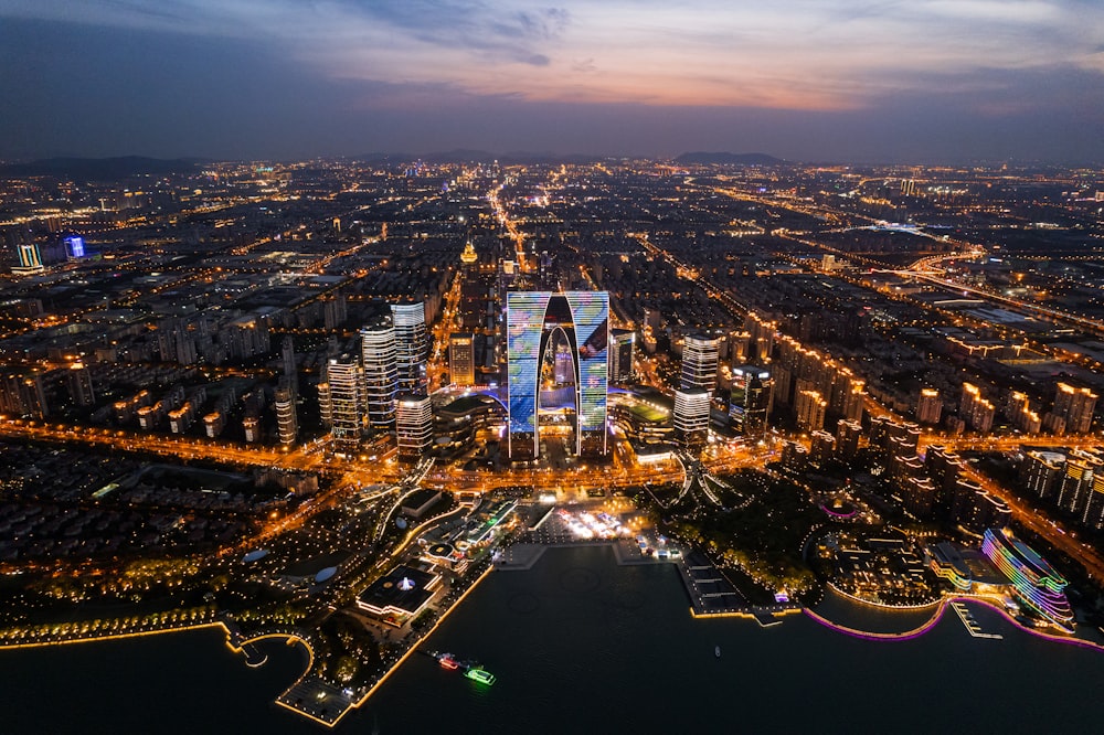 an aerial view of a city at night