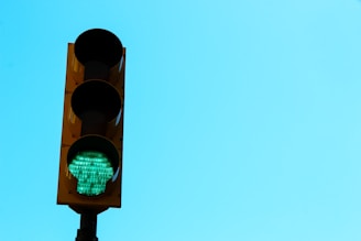 a traffic light with a green light on it
