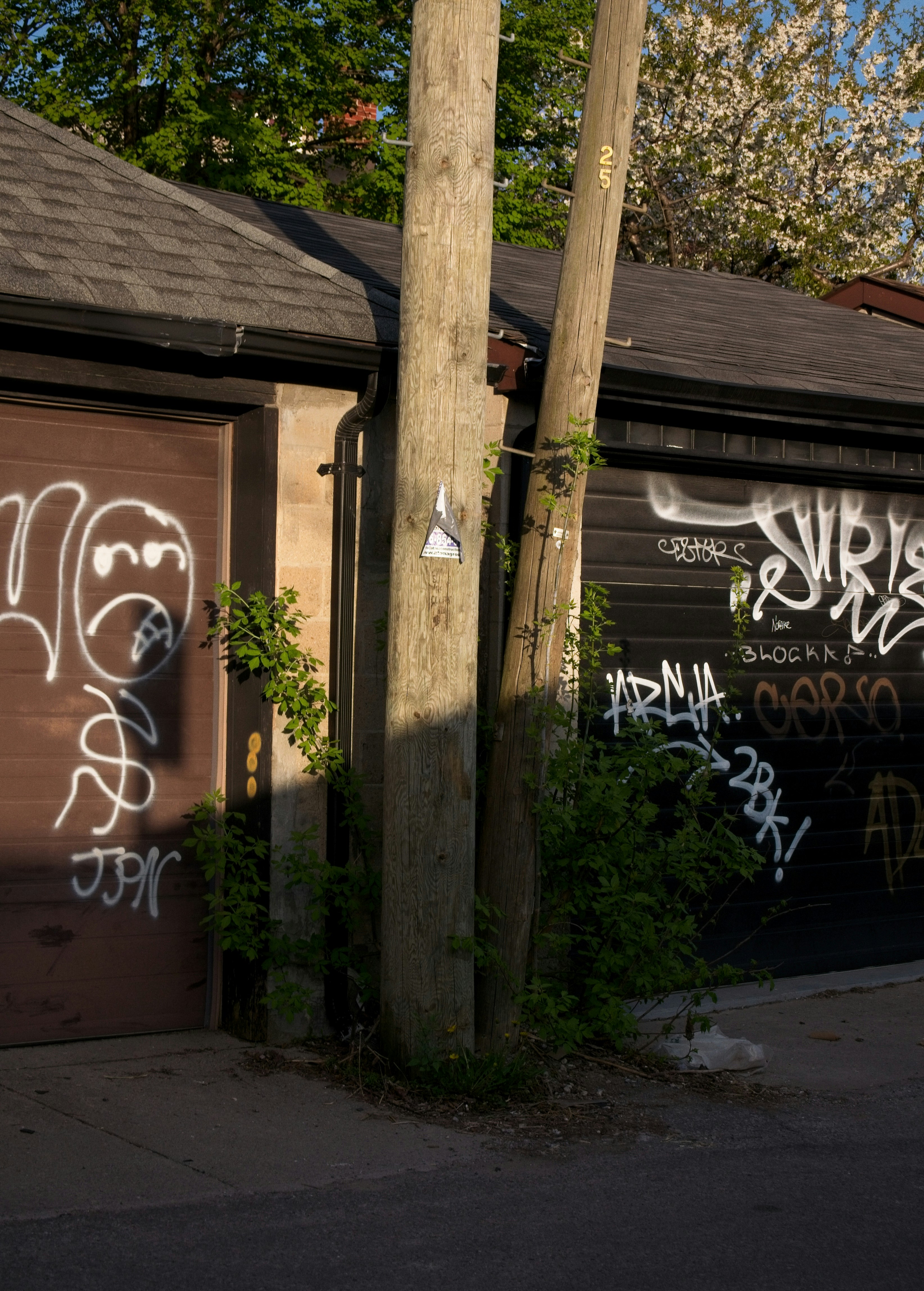 a garage with graffiti on the side of it