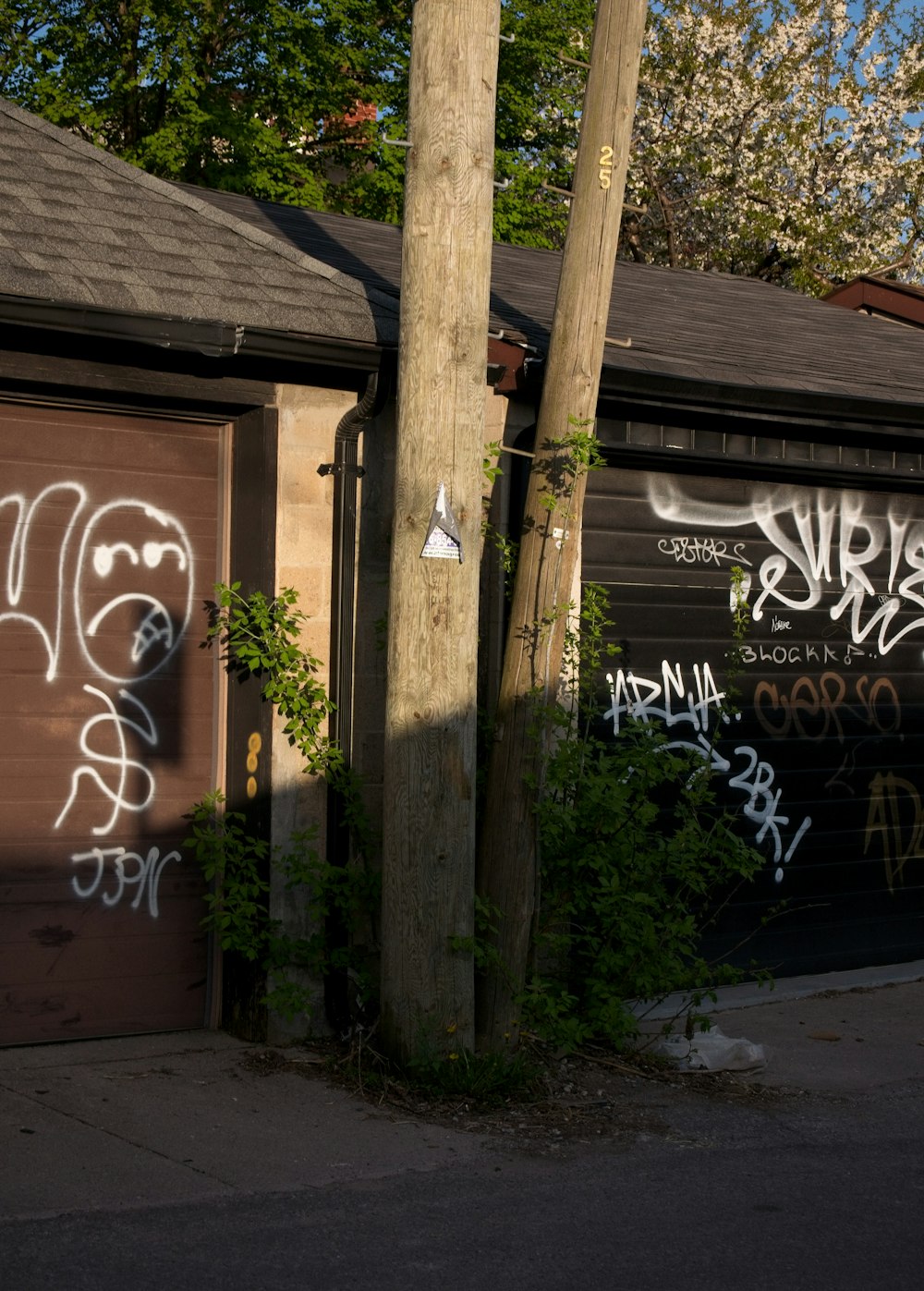 a garage with graffiti on the side of it