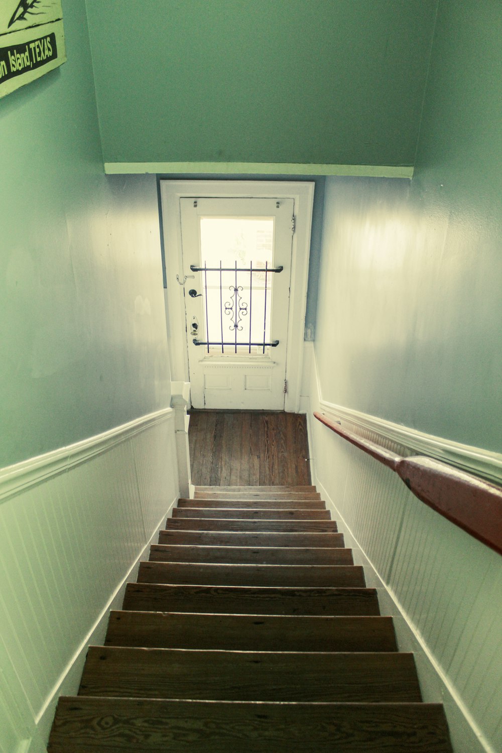 a set of stairs leading up to a door