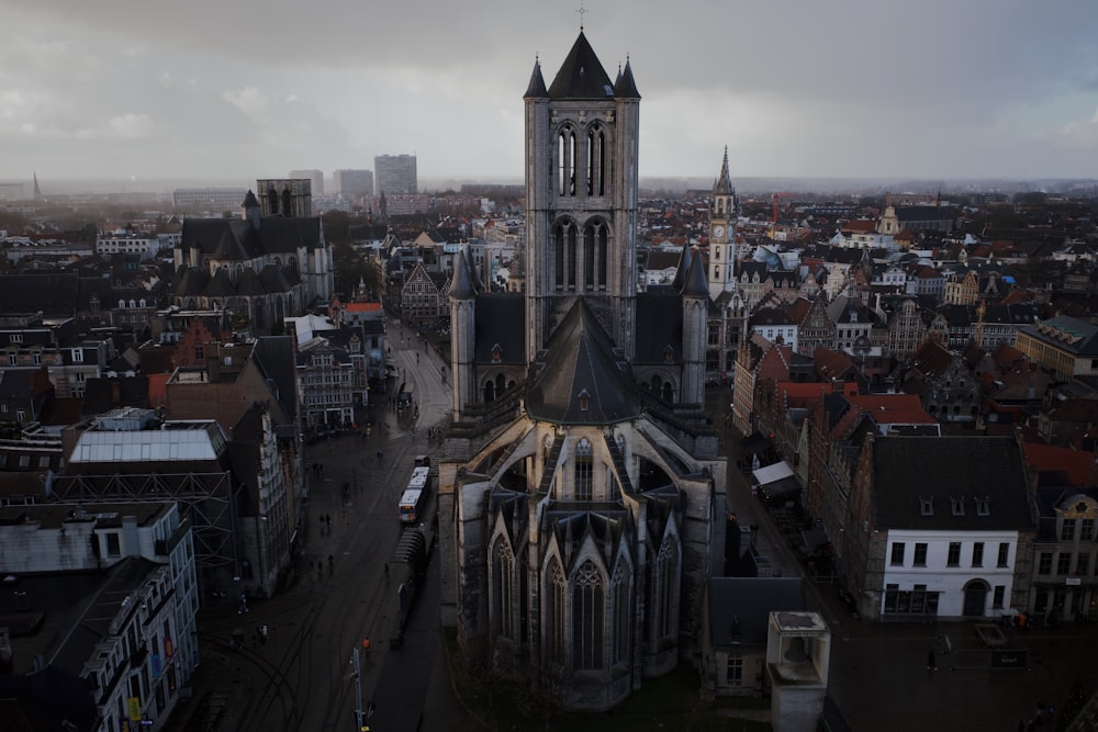 an aerial view of a city with tall buildings