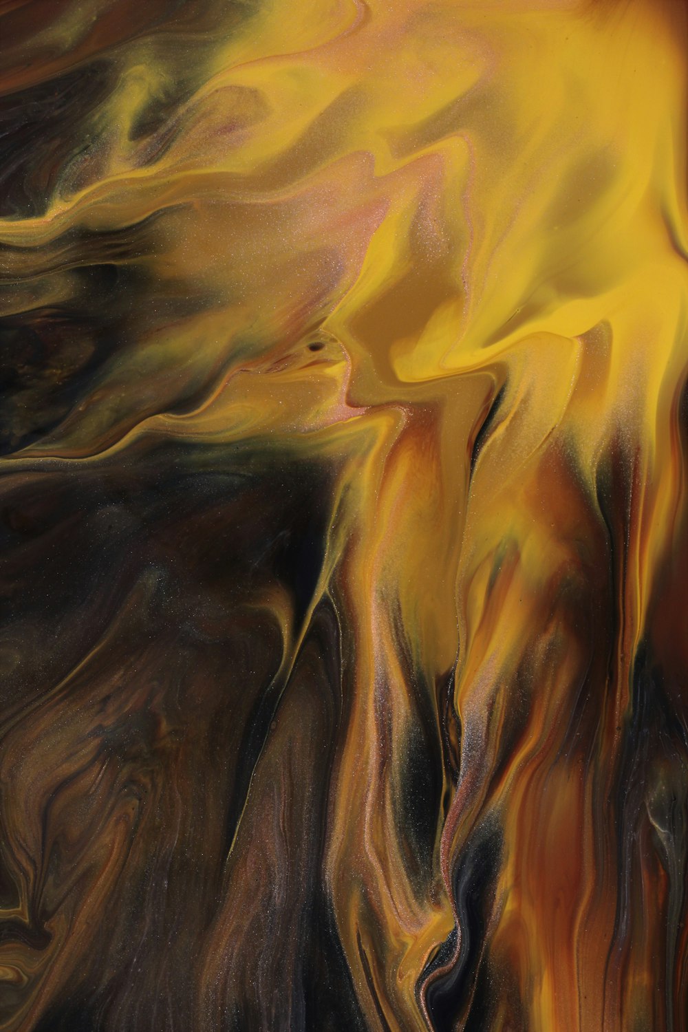 an abstract painting of yellow and brown colors