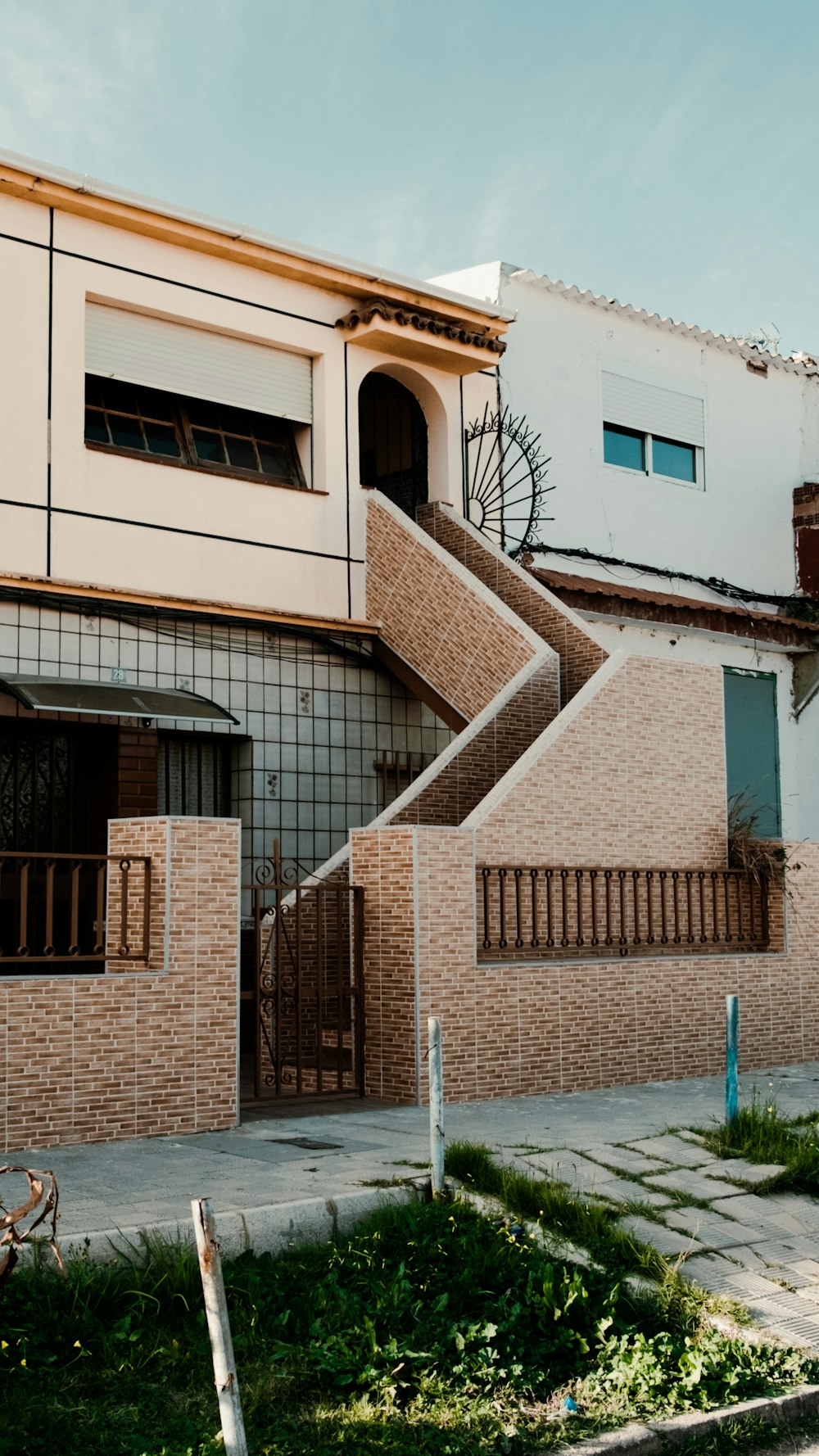 a brick building with a bicycle parked in front of it