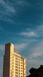a tall building with a clock on the top of it