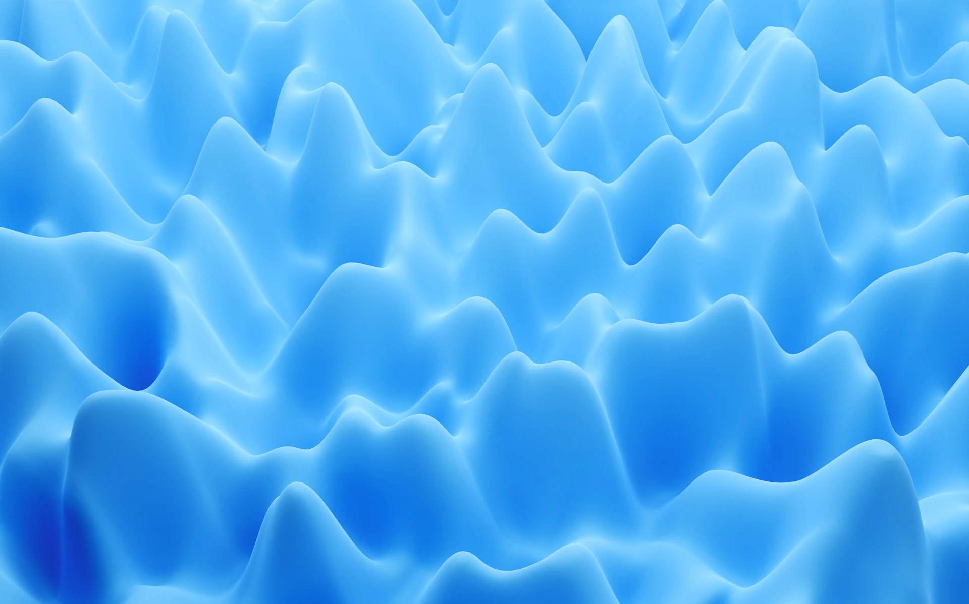 an abstract blue background with wavy shapes