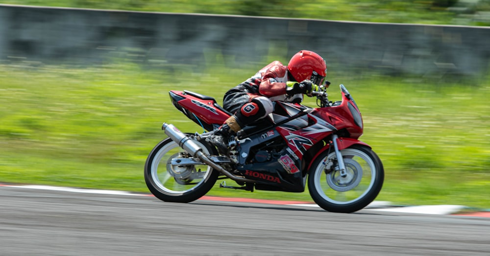 a person riding a motorcycle on a race track