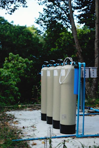 a row of water tanks sitting next to each other