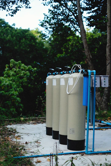 a row of water tanks sitting next to each other