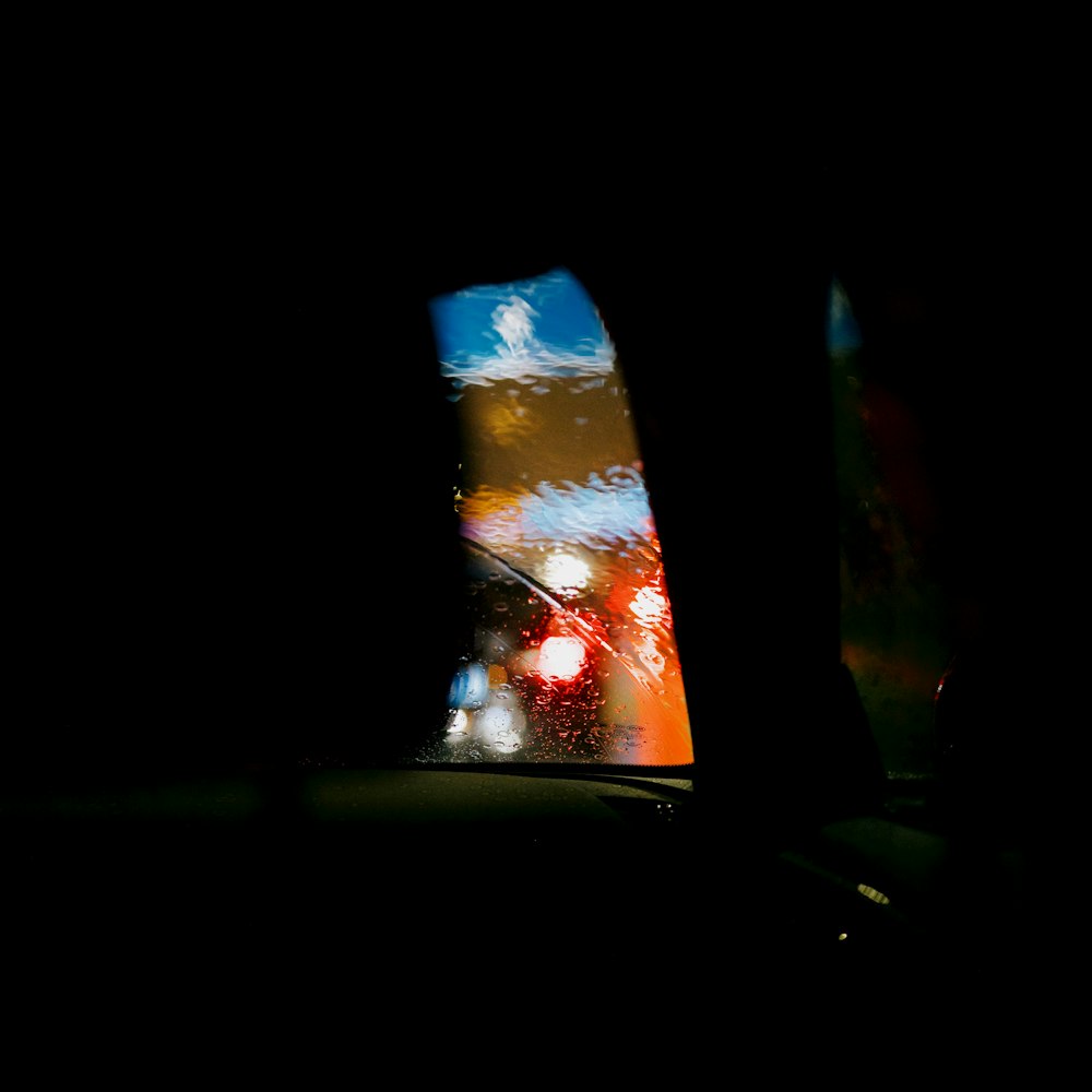 a view of a street from inside a car