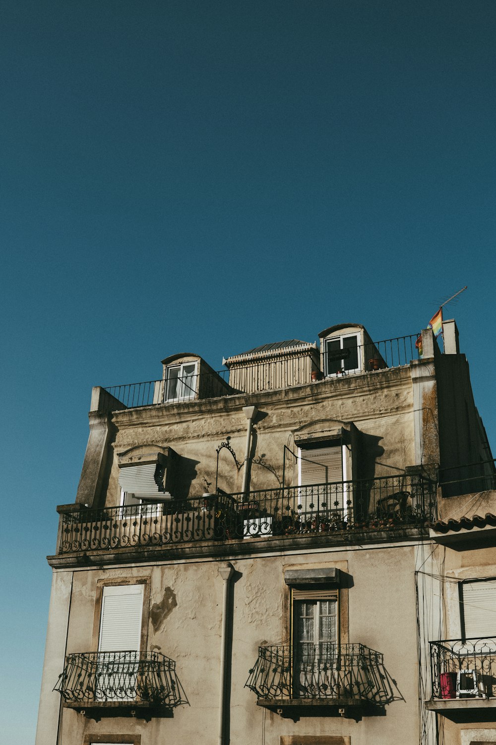 a tall building with balconies and balconies on the balconies