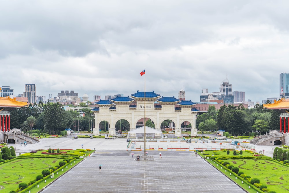 a large building with a flag on top of it