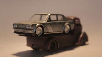 a toy car sitting on top of a table