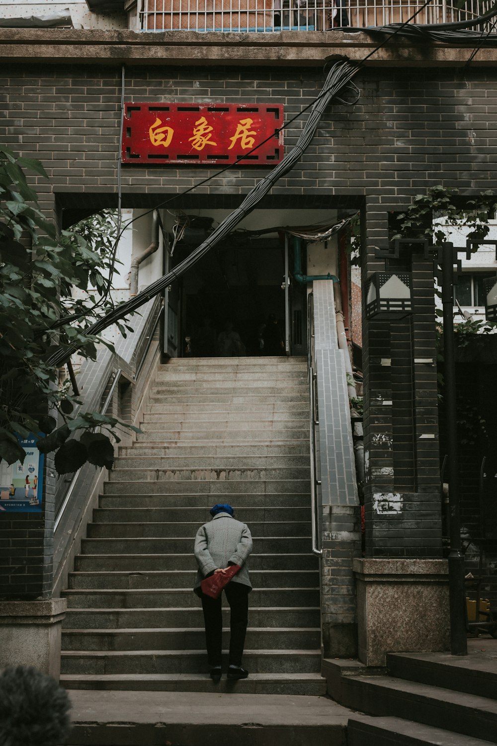 a man walking down a set of stairs