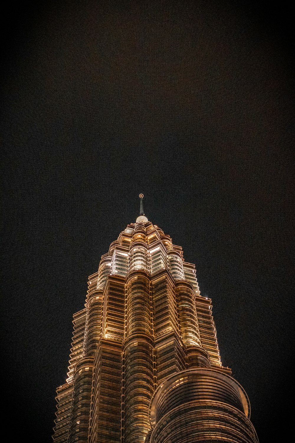 a very tall building lit up at night