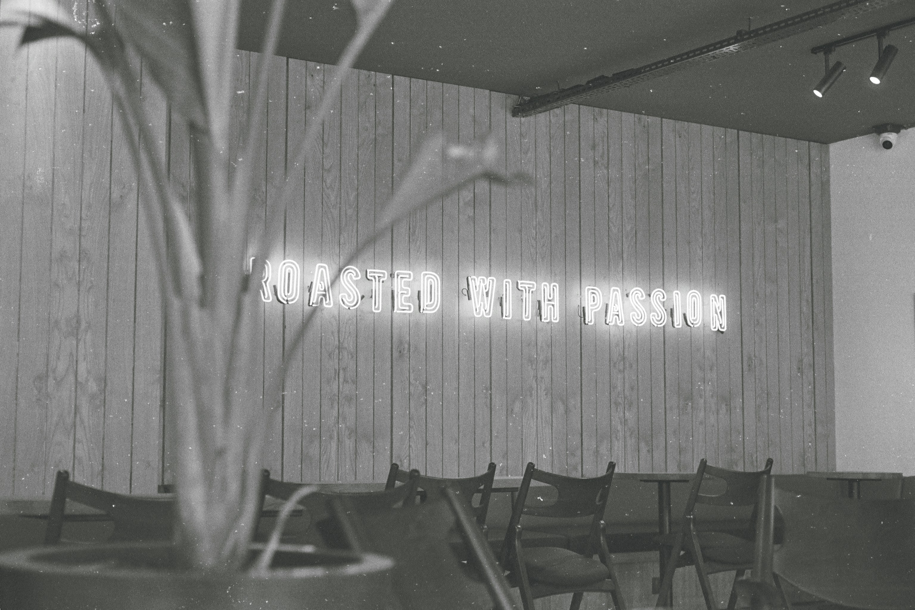 a black and white photo of a restaurant