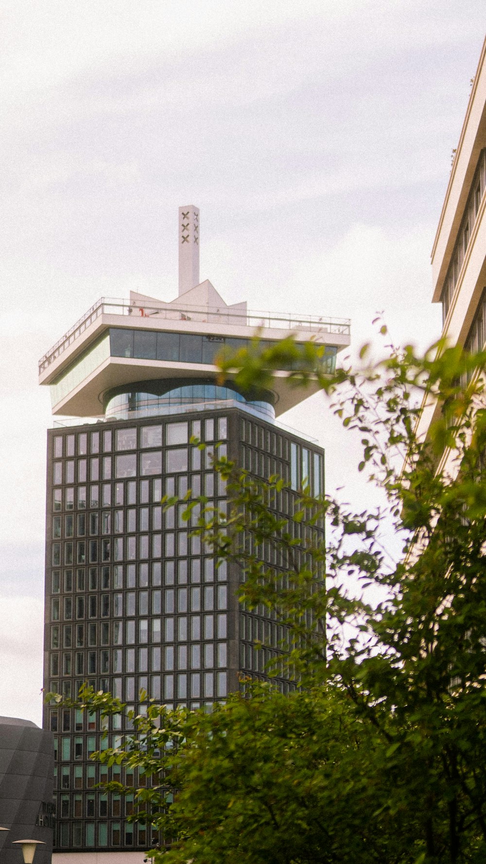 a tall building with a clock on the top of it