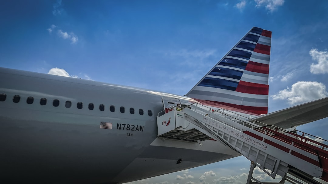 a large jetliner sitting on top of an airport tarmac,