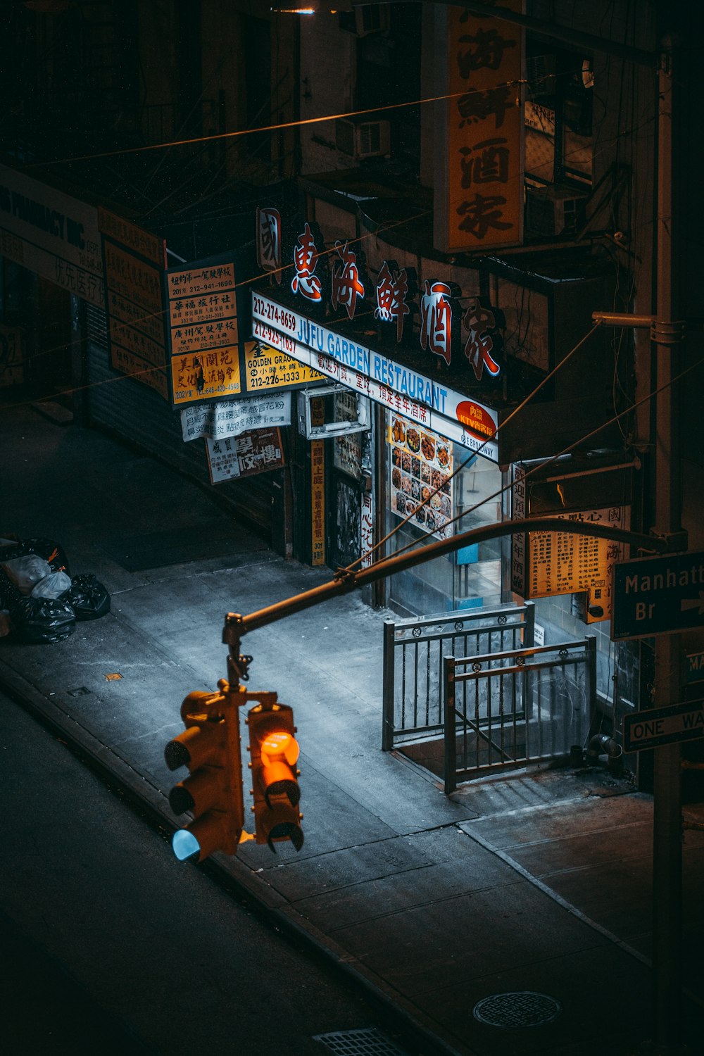 a traffic light sitting on the side of a road