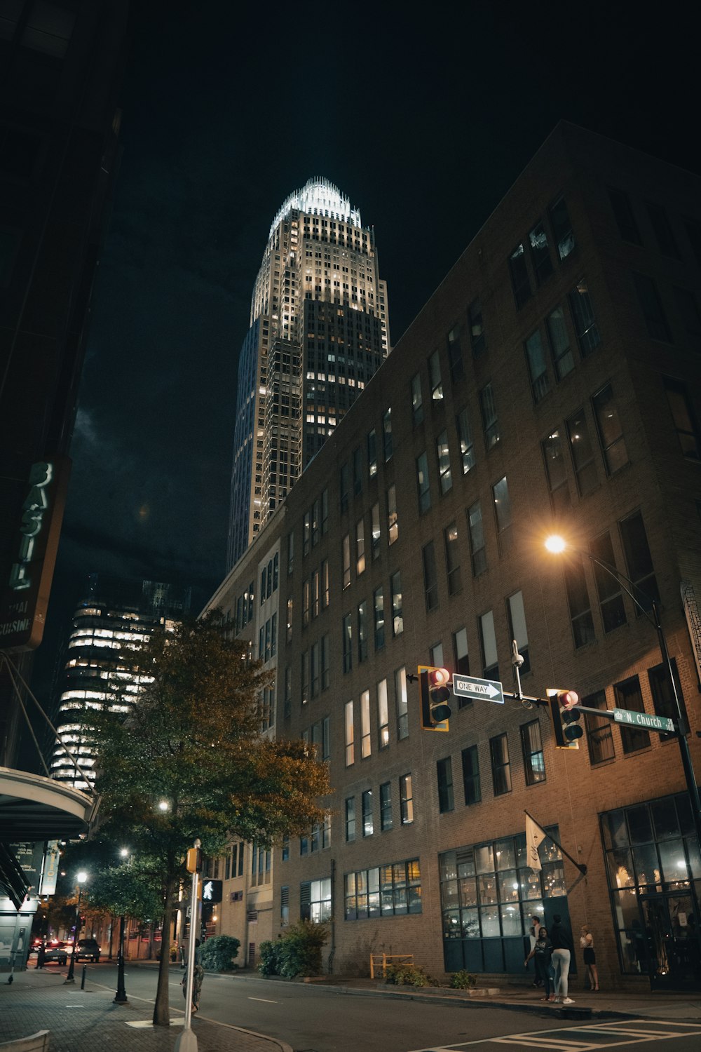 a tall building sitting next to a traffic light